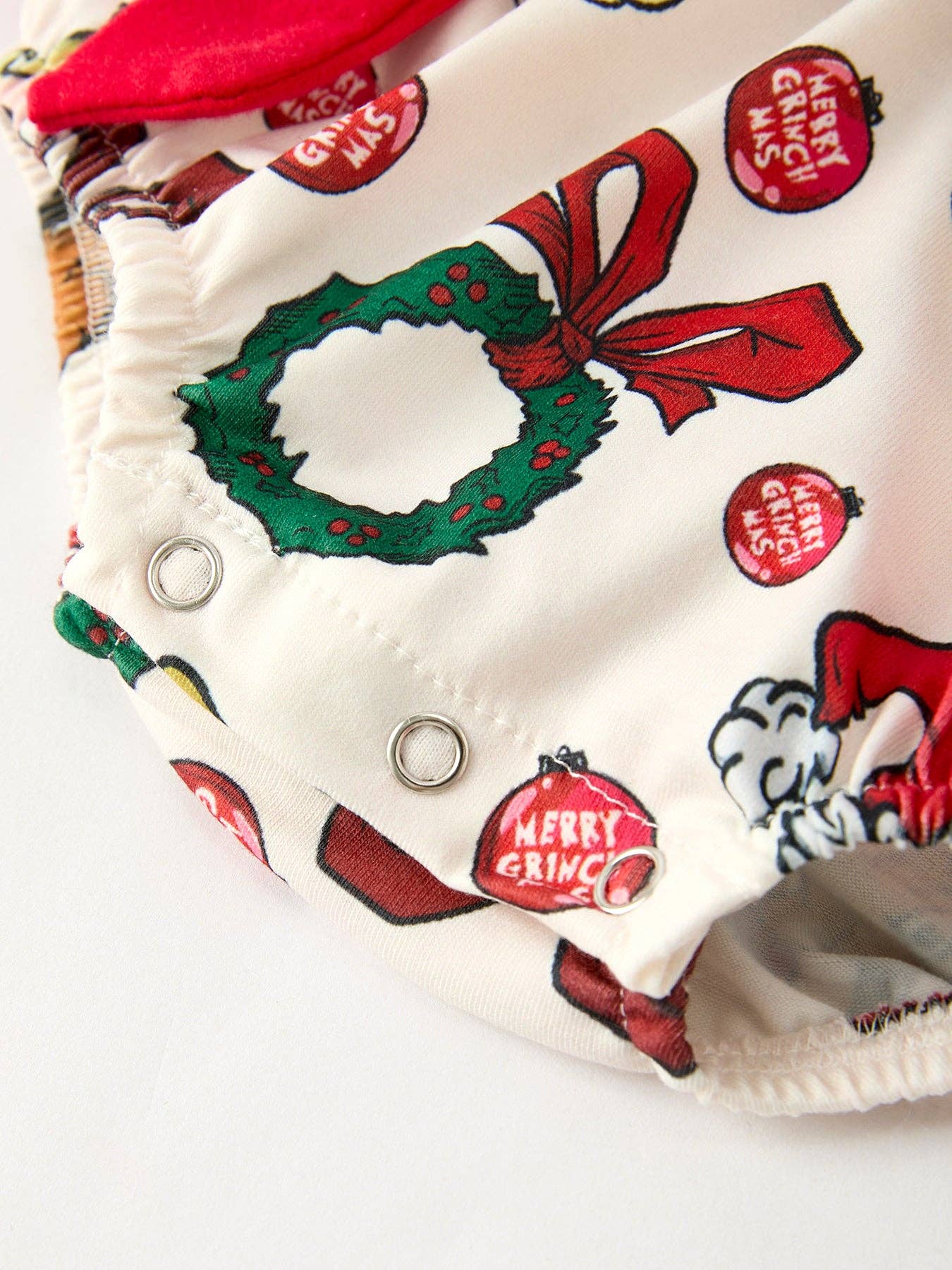 Rylee Faith Designs - Christmas Character Print Baby Girls Romper with Red Bow Detail