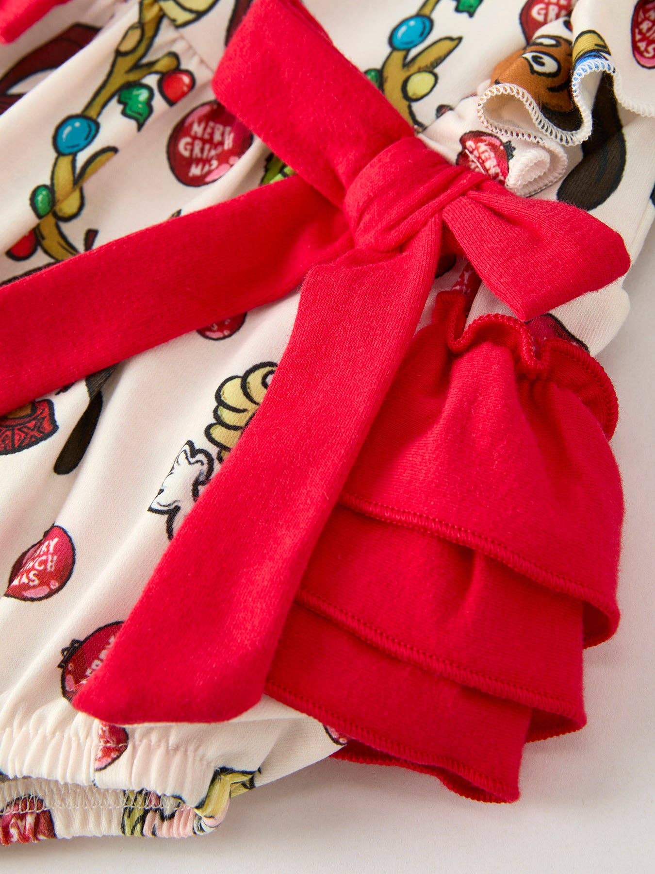 Rylee Faith Designs - Christmas Character Print Baby Girls Romper with Red Bow Detail