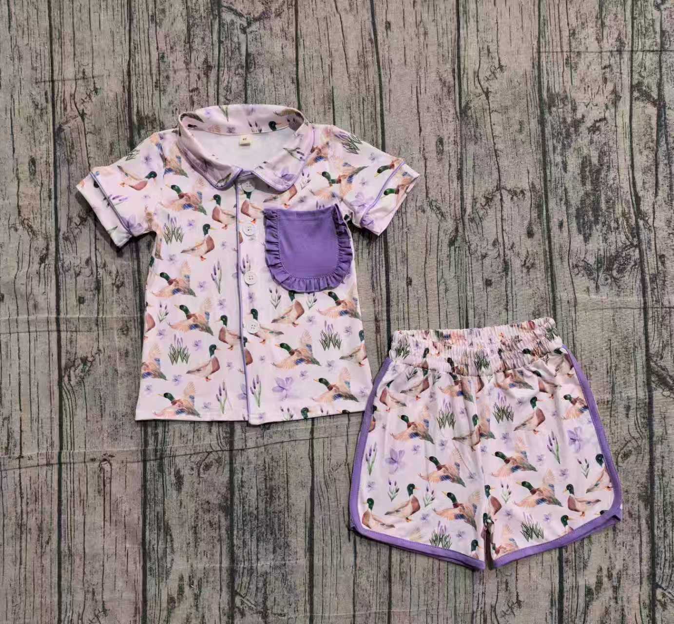 Mallard Duck printed pajamas with purple hem.