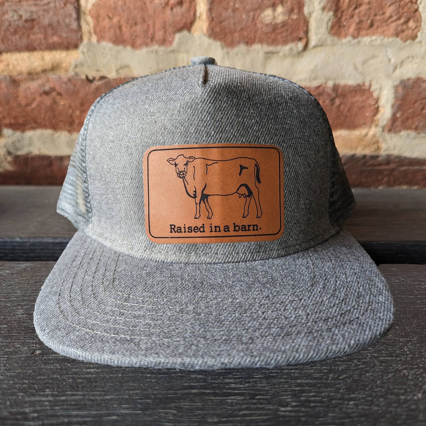 Raised in a barn Cow Country Western Farm Kids Trucker Hat