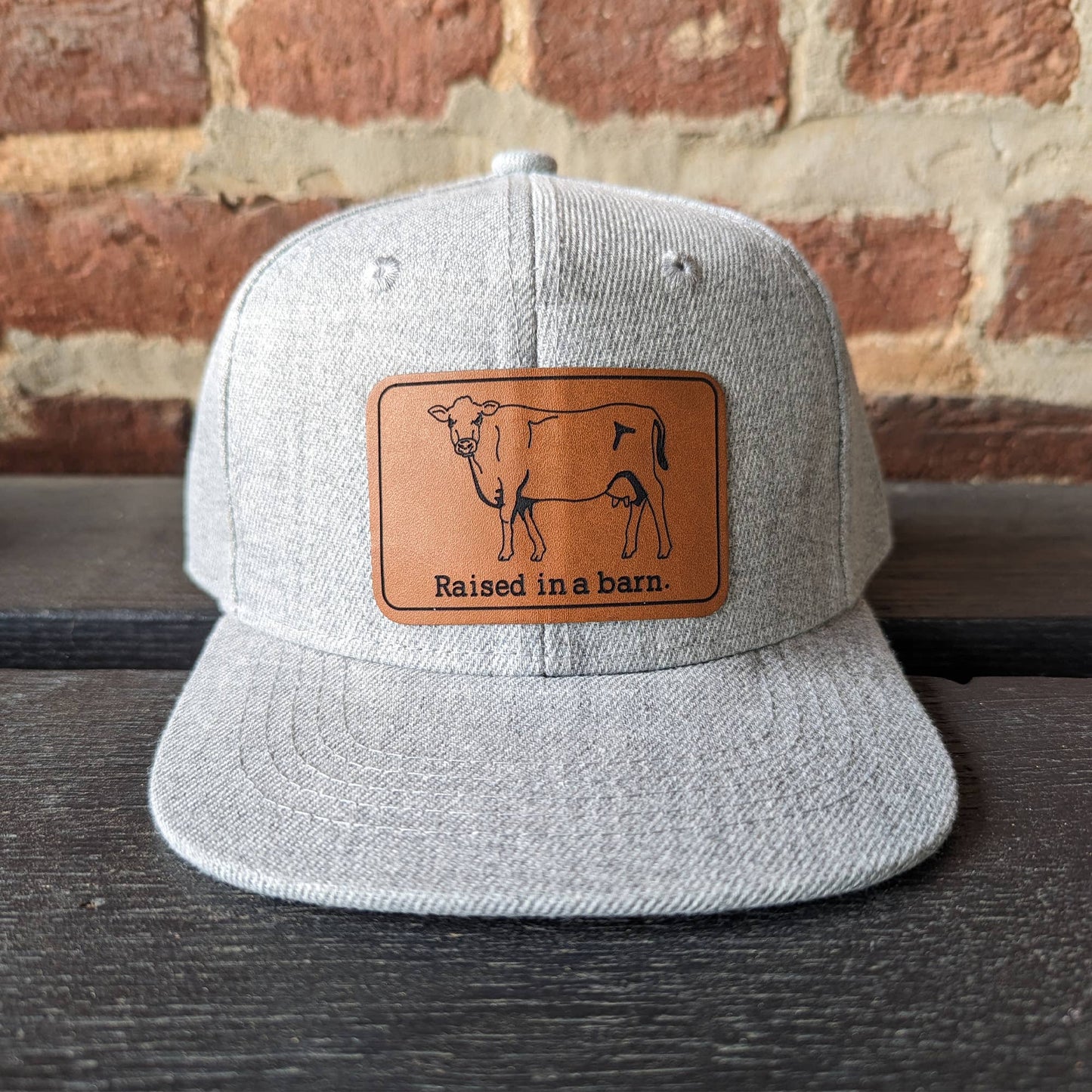 Raised in a barn Cow Country Western Farm Kids Trucker Hat