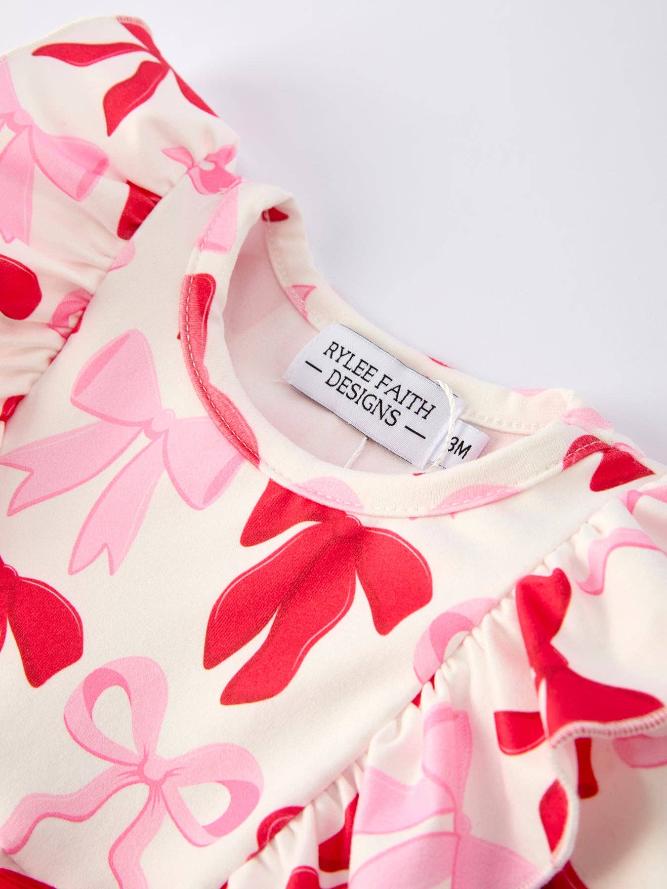 Baby Girls Valentine’s Bow Print Long Sleeve Ruffle Romper