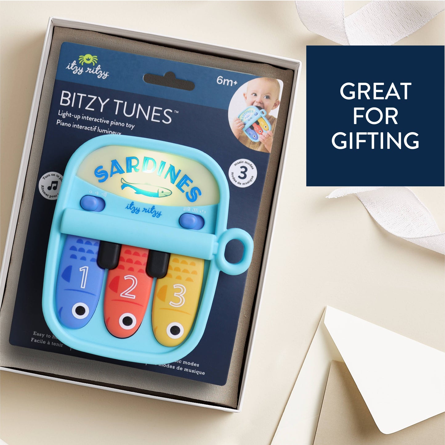 Itzy Ritzy - *NEW* Bitzy Tunes™ Sardines - Light-up Interactive Piano Toy