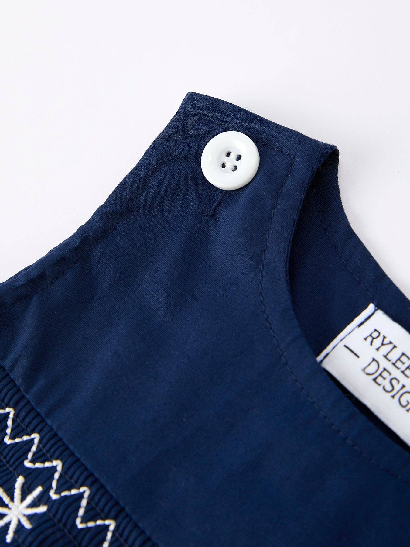 Rylee Faith Designs - Christmas Navy Blue Nativity Smocking Embroidered Baby Boy Romper