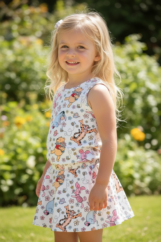 Kids Charm Online - Character printed top & skort. OFG52573 AMY