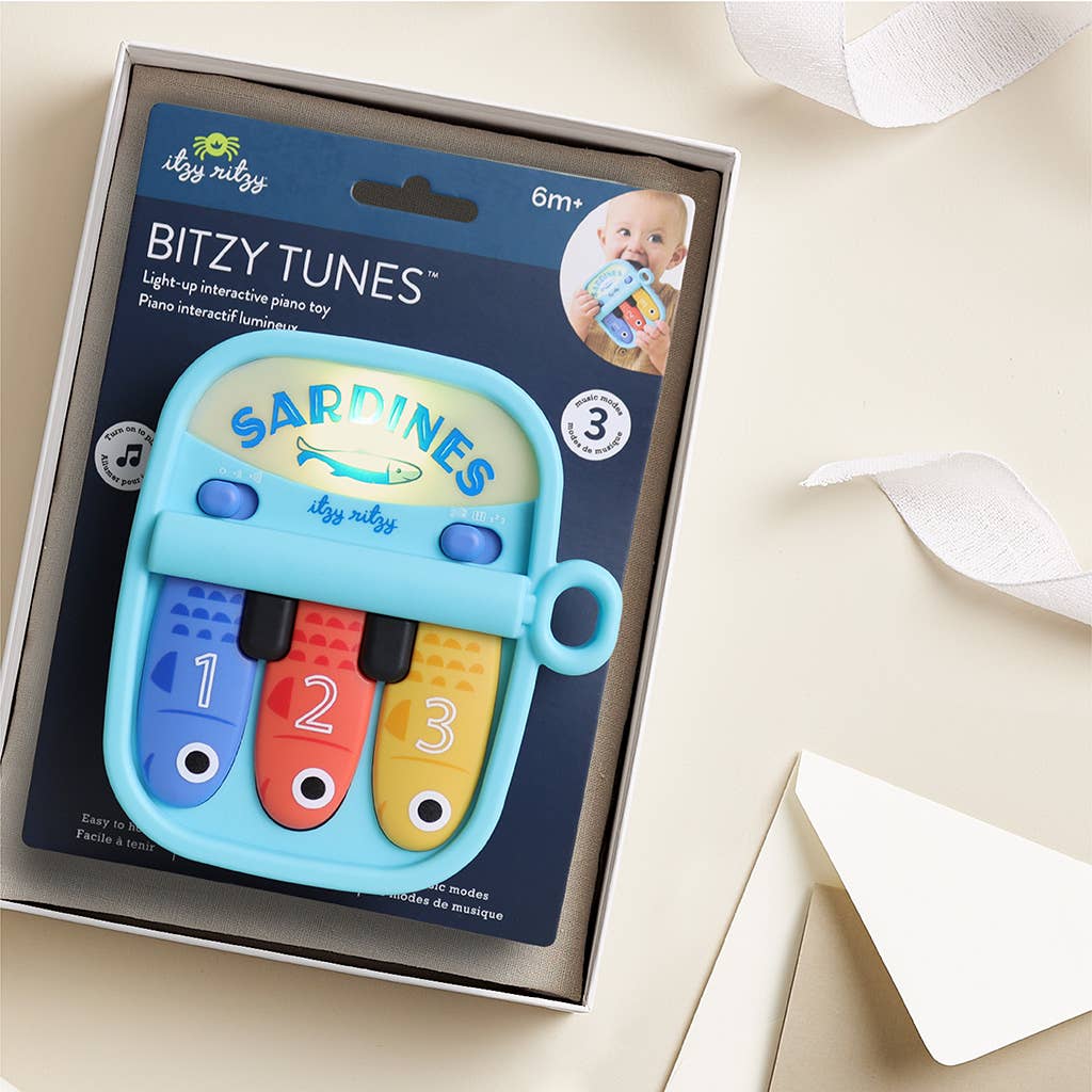 Itzy Ritzy - *NEW* Bitzy Tunes™ Sardines - Light-up Interactive Piano Toy